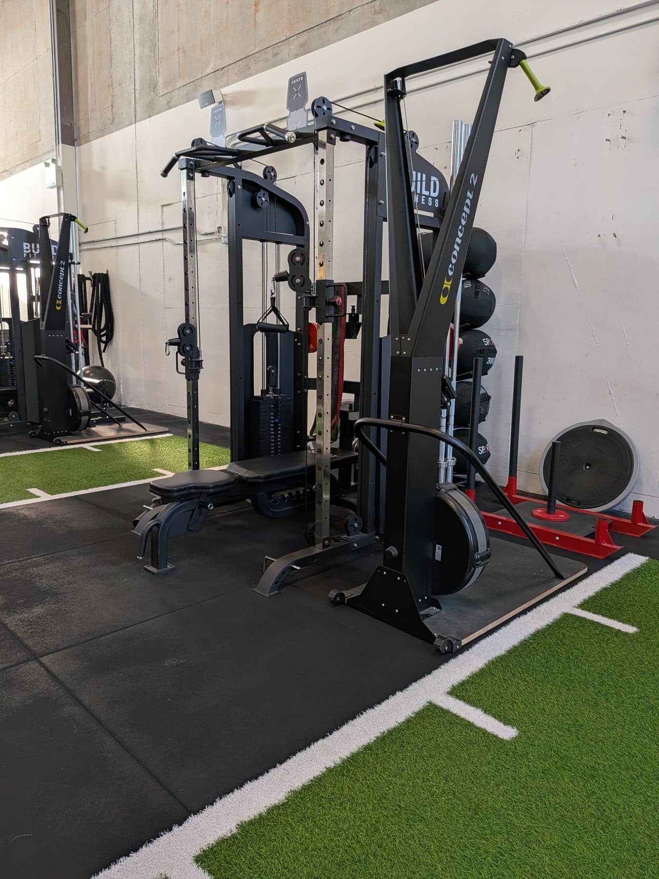 Functional trainer rig, bench and sled at Build Fitness in Port Coquitlam